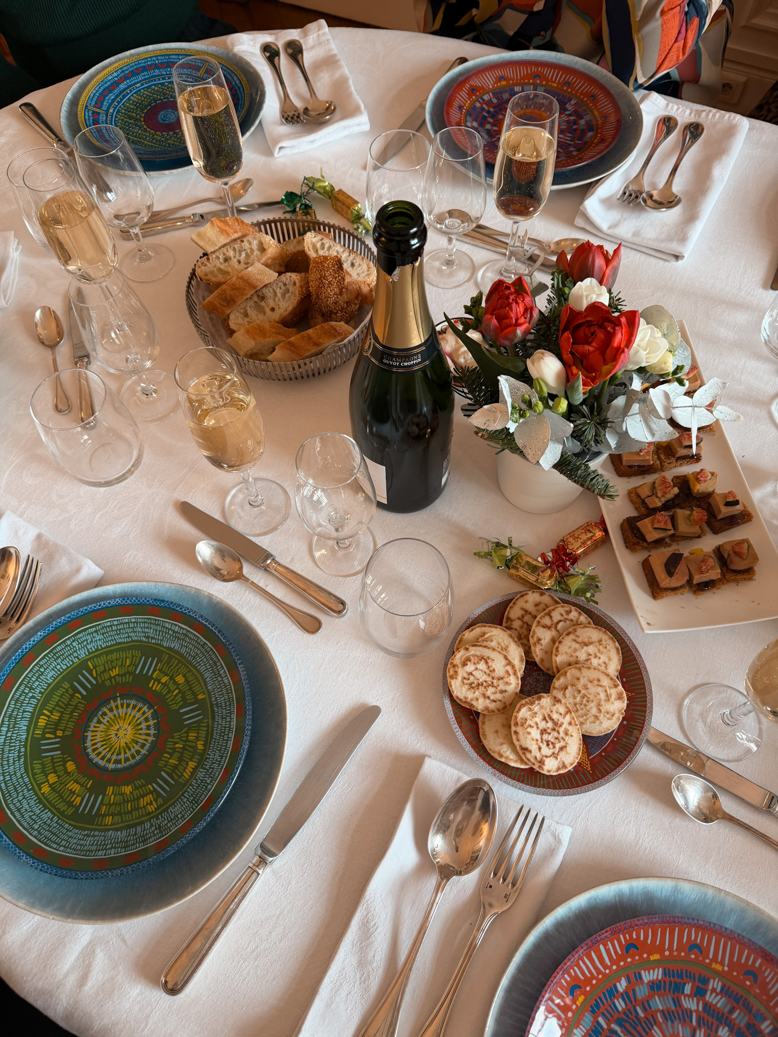 Table setting for new years with a French theme.