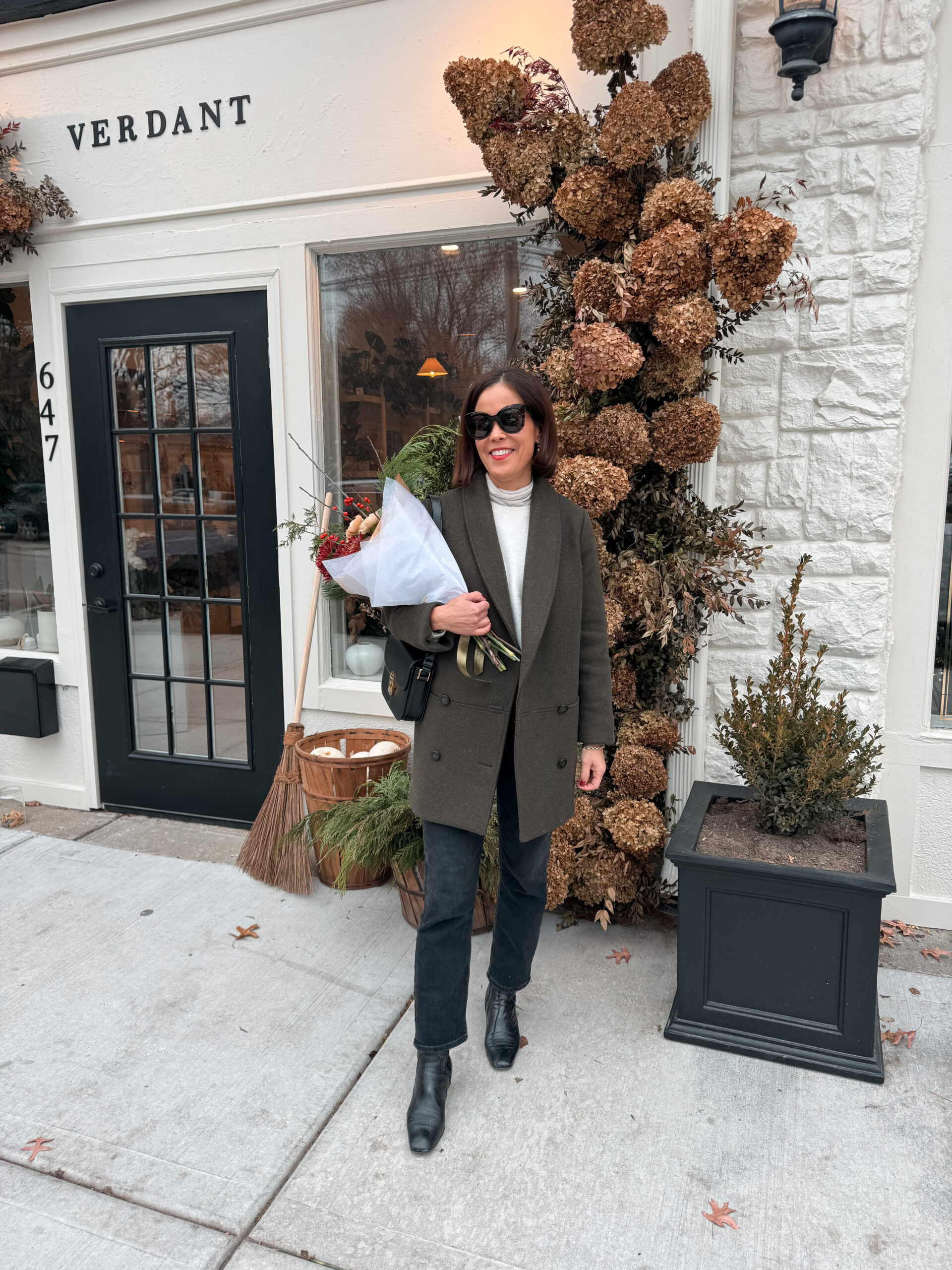 sezane James coat Woman wearing sezane James coat in kakhi color.