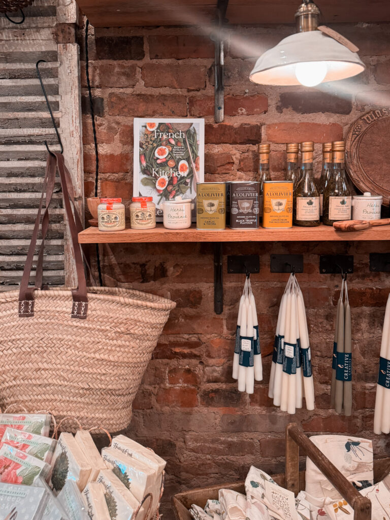 Diptyque candle in kitchen Photo of candles on a wall with olive oil on a wall.