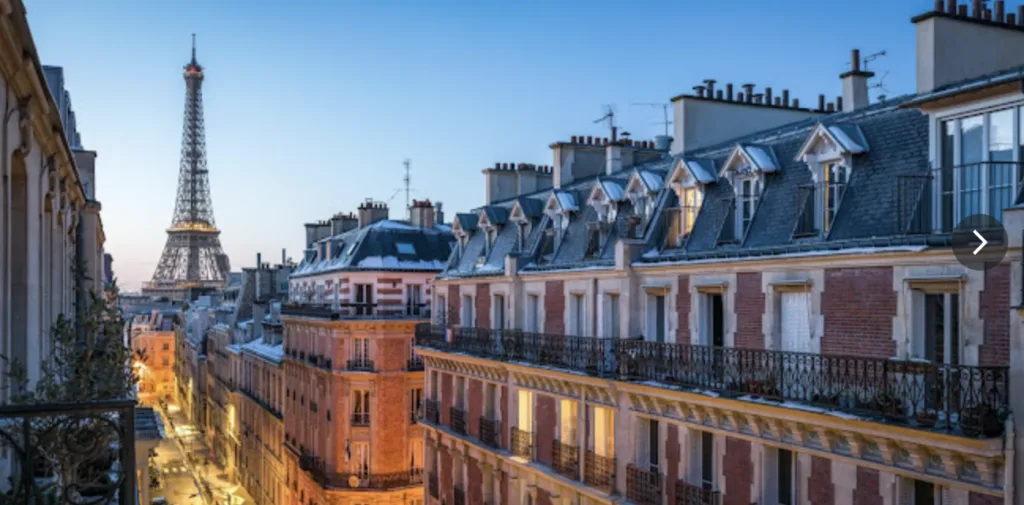 wide shot of Paris with the eiffle tower in the bakcground.