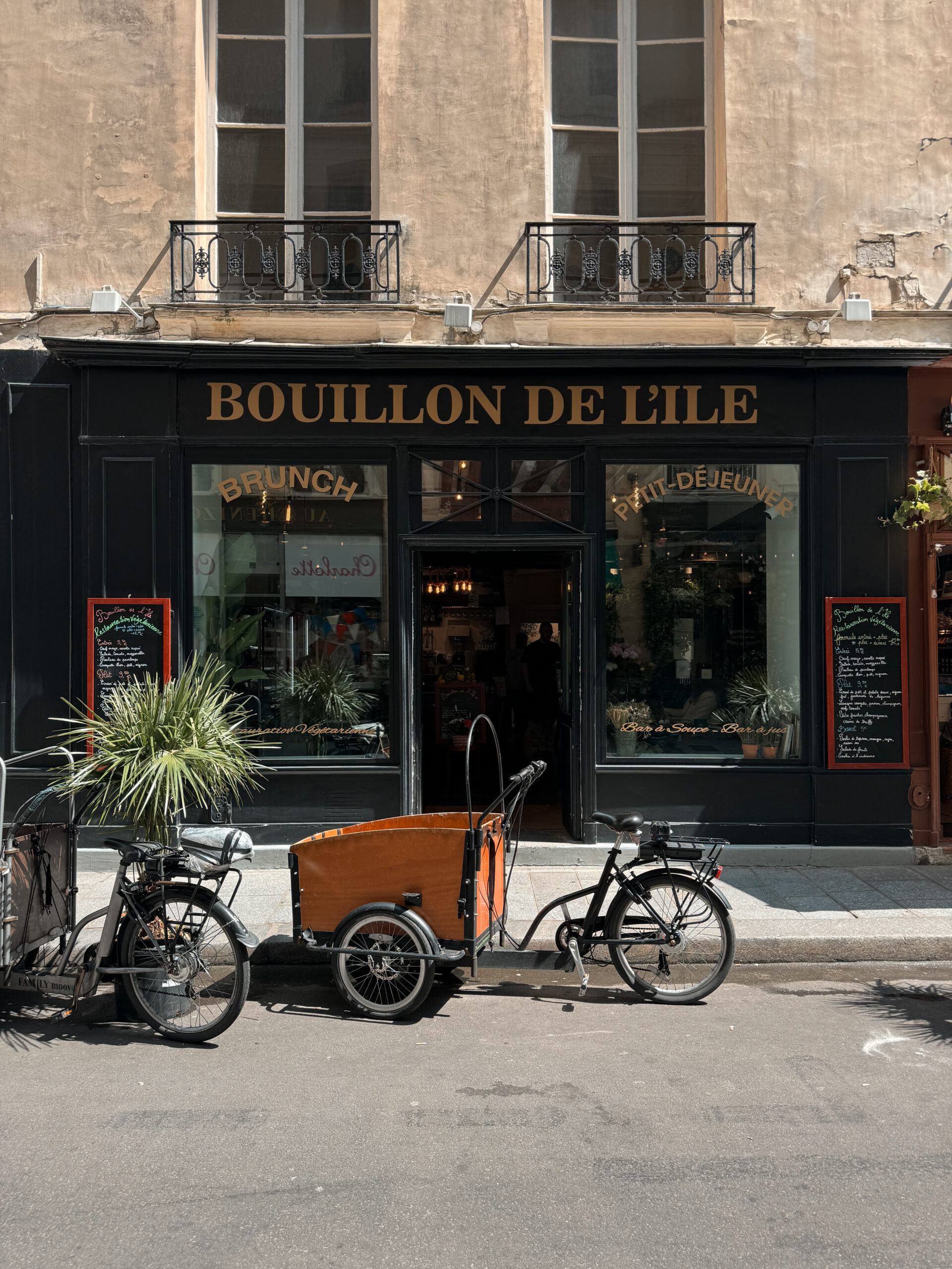 Exterior of a restaurant on ile saint louis in paris.