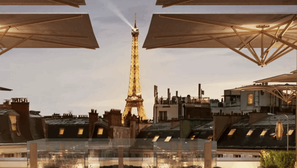 Photo of eiffel towner in teh background sparkling.